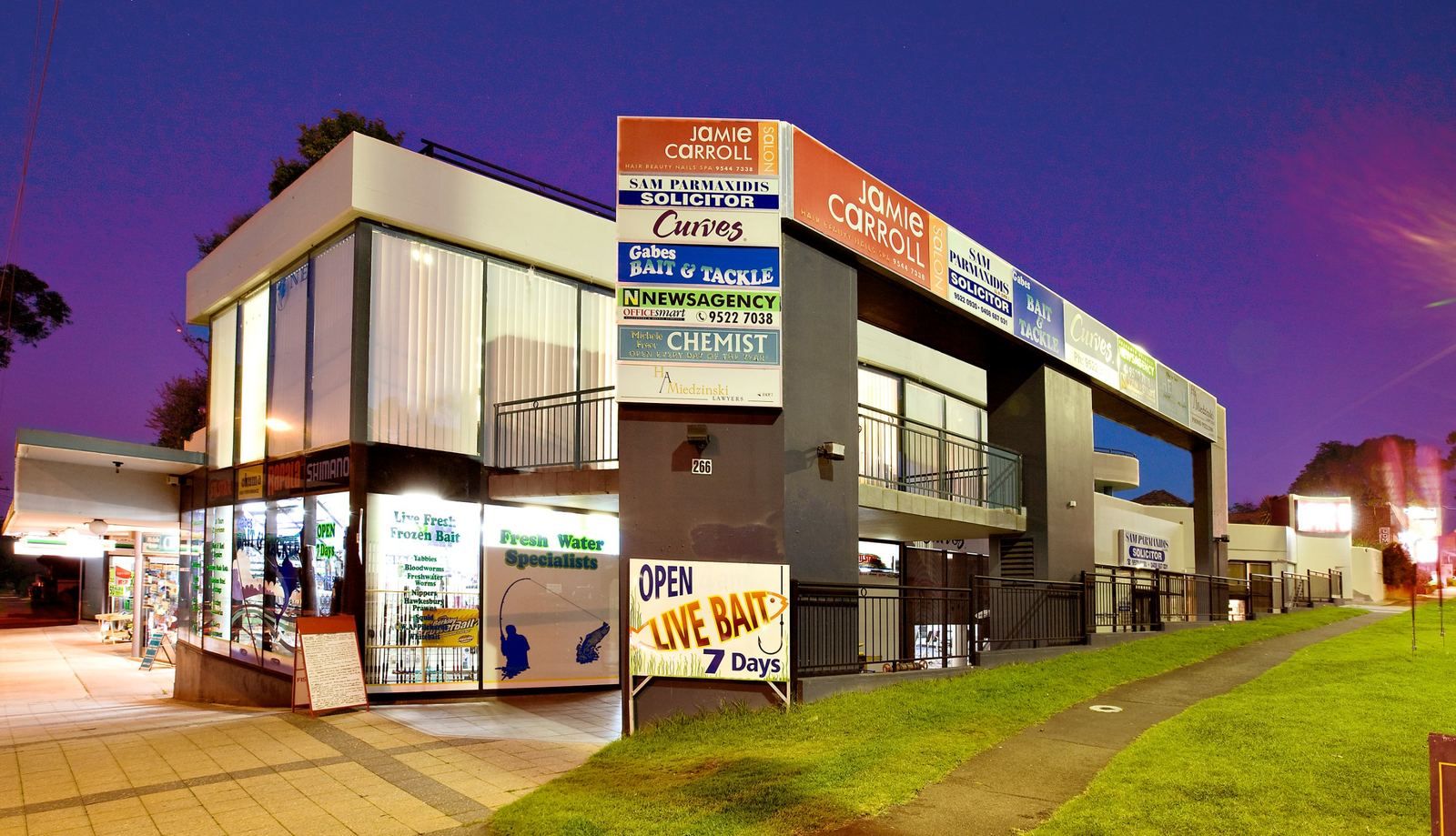 266 Princes Highway, Sylvania, mixed-use building at dusk